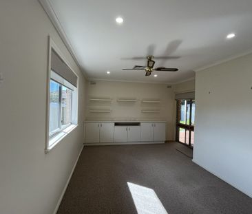 3-Bedroom Family Home with Multiple Living Areas - Photo 1