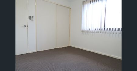 Spacious 4-Bedroom Family Home with Modern Comforts - Photo 3