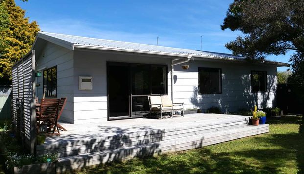 Tidy Three-Bedroom Home with Great Outdoor Living - Photo 1