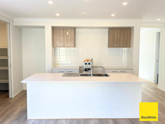 Exceptional Metricon Comfort Meets Modern Living in The Grove - Photo 1