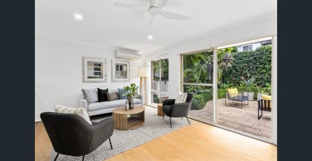 PEACEFUL SINGLE LEVEL LIVING IN A LEAFY SETTING - Photo 2