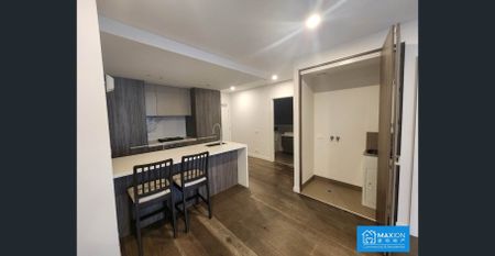 Luxurious North Melbourne Residence | 2 Bedrooms, 2 Bathrooms + City Views & Secure Parking - Photo 5