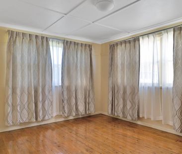 Classic Comfort in Centenary Heights - Photo 2