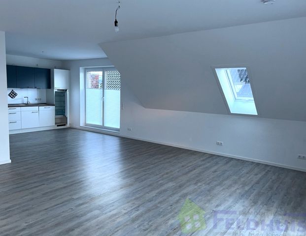 Moderne 2-Zimmer-Oberwohnung mit Balkon in Warsingsfehn! - Photo 1