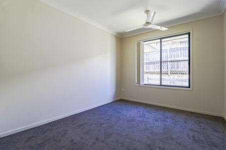 Stylish, Spacious, and Set to Impress - Welcome to 28 Liriope Drive! - Photo 4