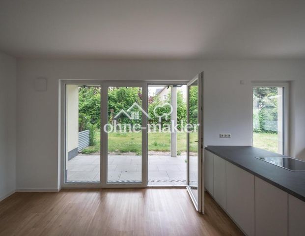 Schwellenlose Wohnung mit Terrasse und Garten - Photo 1