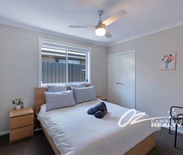 Spacious 4-Bedroom Fully Furnished Home - Photo 6