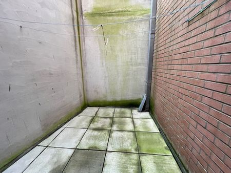 Ruim zonnig appartement met drie slaapkamers, twee badkamers en terras in een gebouw op de Markt. - Foto 5