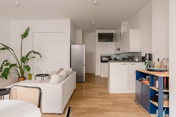 Gelijkvloers appartement met zuid georiënteerde tuin aan het oude Gerechtshof - Photo 1