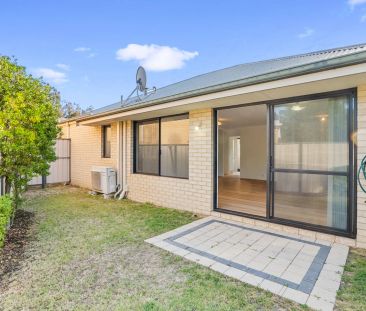 Ideally Located for easy care living - Photo 4