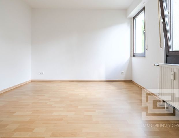 Traumhaft gelegene 2-Zimmer-Wohnung mit Terrasse und Garten in unmittelbarer Citynähe Langenfelds! - Foto 1