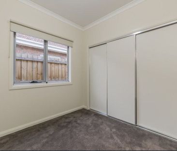 MODERN THREE BEDROOM HOME IN GREAT LOCATION - Photo 1