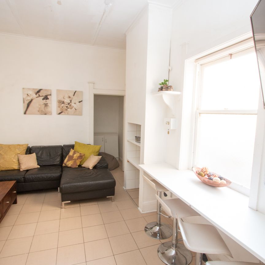 SPACIOUS FOUR BEDROOM HOUSE - Photo 1