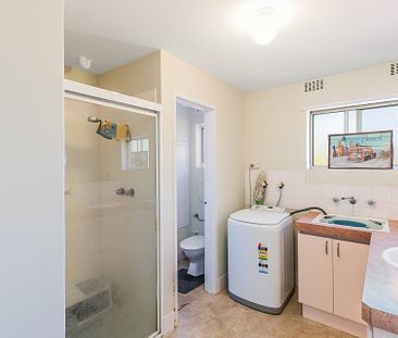 Charming 2-Bedroom Unit with Pool Views in Convenient Location - Photo 4
