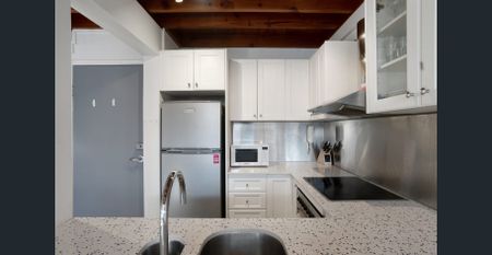 Fully Furnished Loft Style One Bedroom Apartment - Photo 5