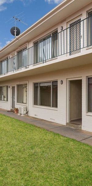 Open the Door to a Coastal Unit in Marino - Photo 1