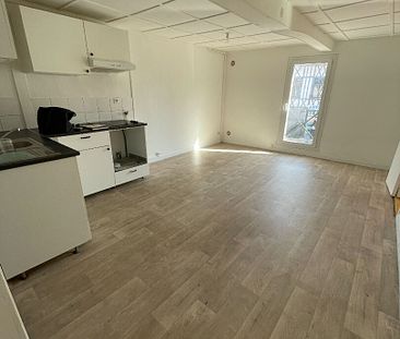 Centre de BOURG ACHARD - Appartement 2 pièces et 1 bureau de 49 m2 - Photo 4