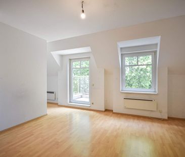 Schöne 4-Zimmer-DG-Maisonette am Lorenz-Bayer-Park mit zwei Balkonen - Photo 1