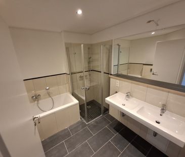 Erstbezug – Exklusiver Neubau im Zentrum mit Balkon, Fußbodenheizun... - Photo 4