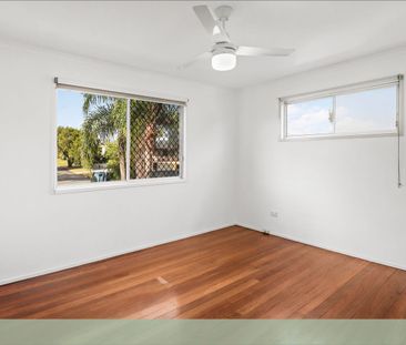 Spacious Highset Home with a Big Backyard & Walk to the Train - Photo 3