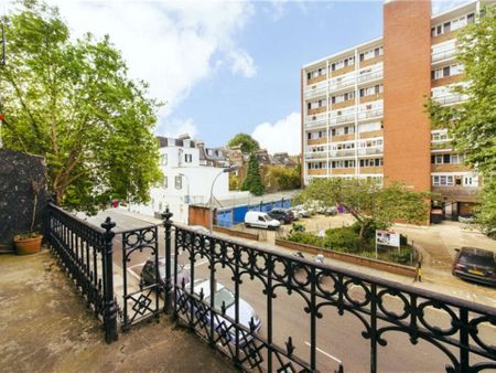 A modern first floor one bedroom apartment with wooden floors in the reception room. - Photo 2