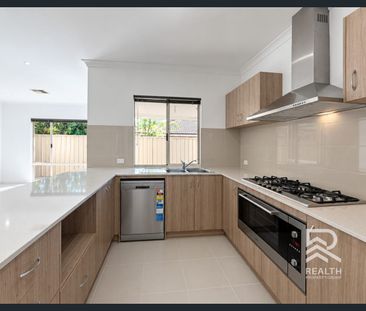 Modern 3-Bedroom Home with Theatre Room in Cannington - Photo 6