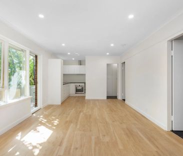 SUNLIT SANCTUARY IN THE HEART OF SANDY VILLAGE - Photo 5