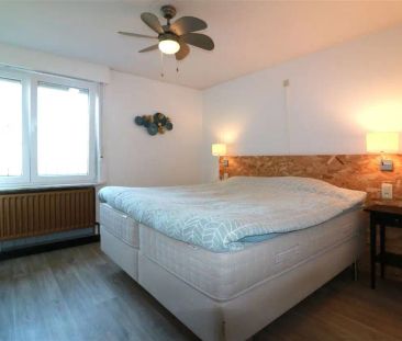 Gusting gelegen woning met 2 slpk, garage en tuin - Foto 4