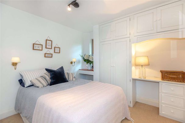 Situated in one of the most sought after roads in Englefield Green, a detached house full of character set in magnificent gardens with swimming pool. - Photo 1
