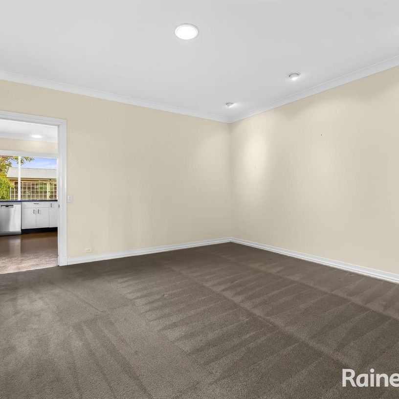 Expansive Family Home with Pool, Multiple Living Zones and City Views - Photo 1