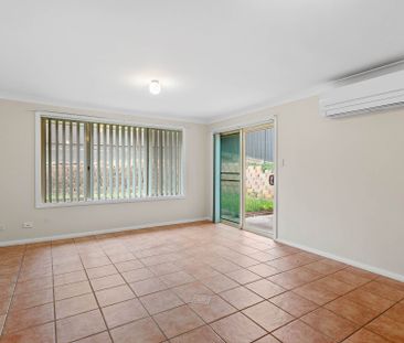 Low-maintenance living just moments from the CBD - Photo 1