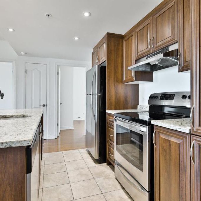 Lumineux 4 1/2 moderne tout inclus, vue imprenable sur le fleuve – Disponible immédiatement à Brossard - Photo 1