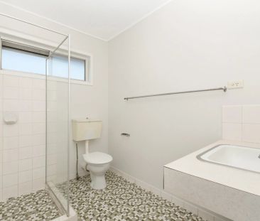 Well-Located Two-Bedroom Apartment with Carport - Photo 5