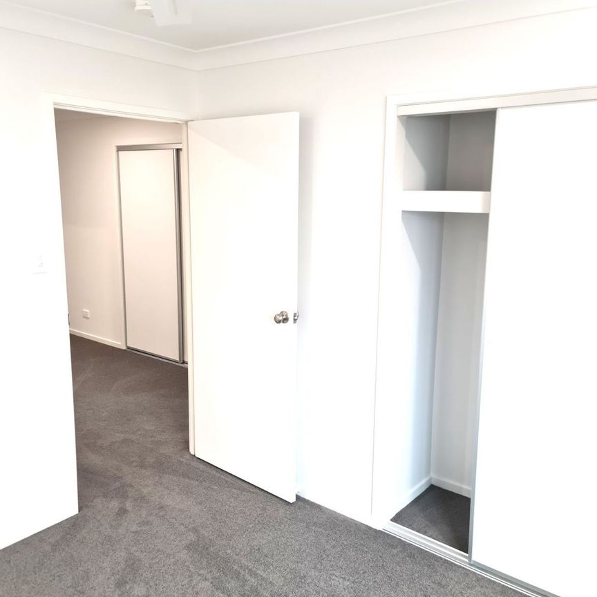 2 ENSUITE BATHROOMS PLUS MAIN BATHROOM-4 BEDROOM- FULLY DUCTED AIR-CONDITIONED TOWNHOUSE - Photo 1