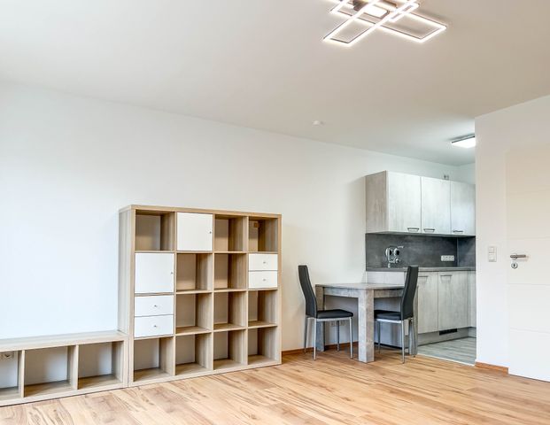 Möblierte Balkonwohnung direkt an der U3-Haltestelle - Foto 1