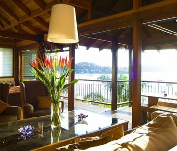 WATERFRONT BALINESE-STYLE OASIS - 8 MONTH LEASE! - Photo 1