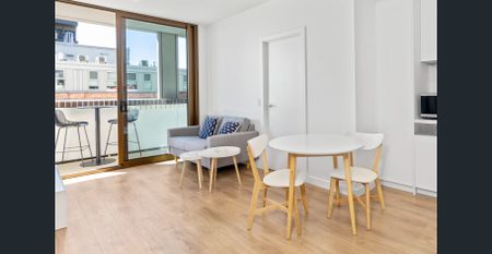 Sleek, secure CBD living - FURNISHED - Photo 2