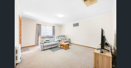 Comfortable 3-Bedroom Home in a Convenient Location - Photo 2