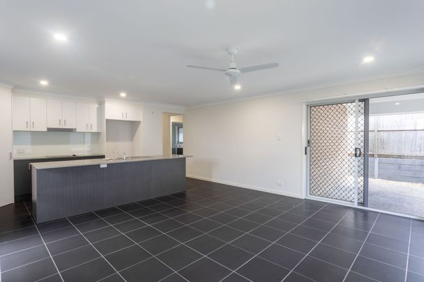 Beautiful family home in the thriving Providence Estate! - Photo 1