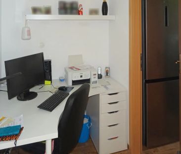 Großzügige Dachgeschosswohnung mit Balkon und schöner Aussicht! - Foto 4