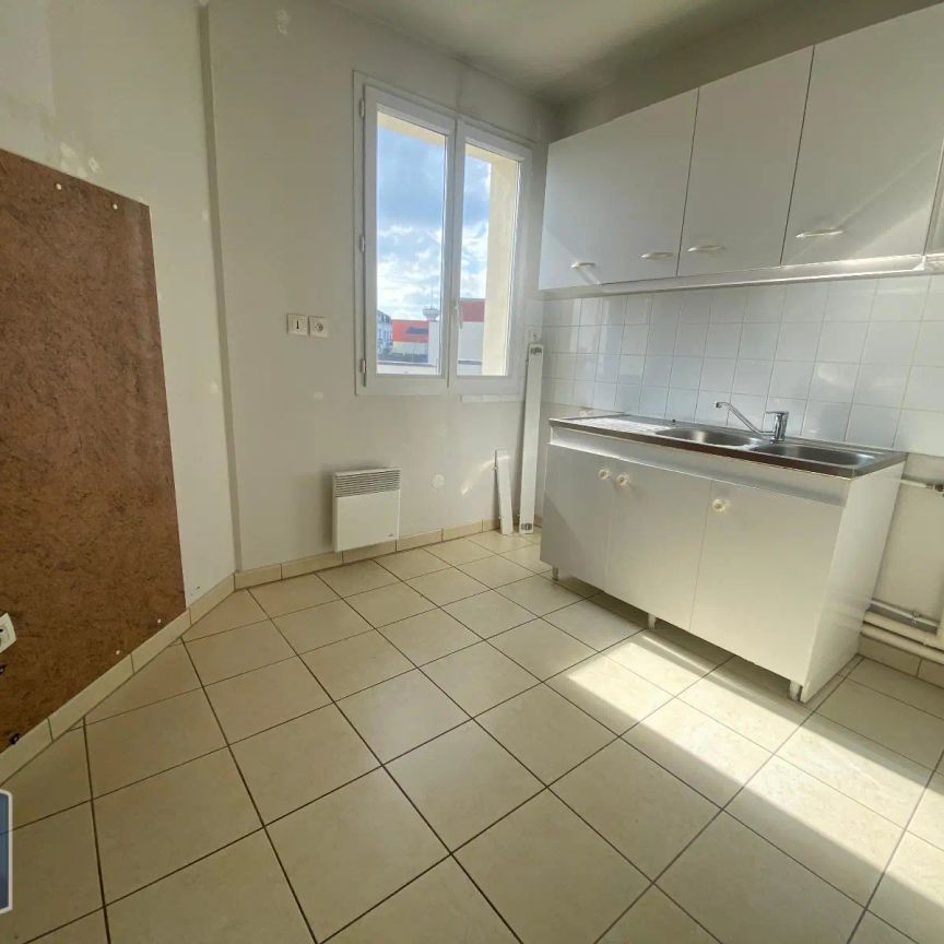 Appartement à louer 4 pièces 76.8m² - Photo 1