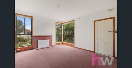 Charming 3-Bedroom Home in a Convenient Location - Photo 2