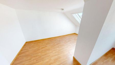 Charmante Dachgeschosswohnung im Altbau - Foto 3