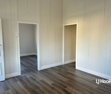CHARMING QUEENSLANDER WITH MODERN UPDATES & ROOM TO MOVE - Photo 1