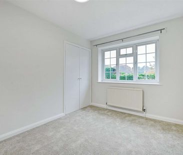 An updated four bedroom detached home located only 1.3 miles to the... - Photo 4