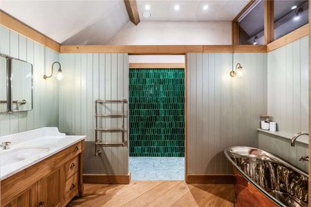 A stunning Grade II-listed barn conversion with beautifully imagined, high specification interiors, in the heart of an idyllic Cotswolds village - Photo 3