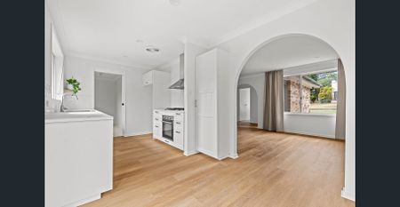 This beautifully renovated 3-bedroom brick home - Photo 4