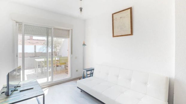 With a private terrace, split-level layout, and plenty of natural light. - Photo 1