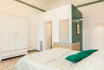 Center-Historic Jewish Quarter: Elegant apartment situated in beautiful Palazzo Nobiliare. Entrance, spacious living with original wood frescoed ceilings, large modern dining and kitchen, 4 bedrooms, 4 Baths, small terrace. #1527