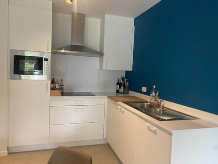 Gelijkvloersappartement met 1 slaapkamer en tuintje - Photo 2